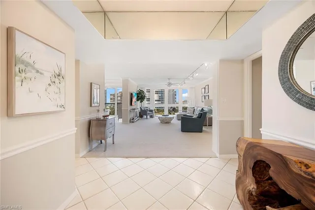 a view of a livingroom with furniture and a window