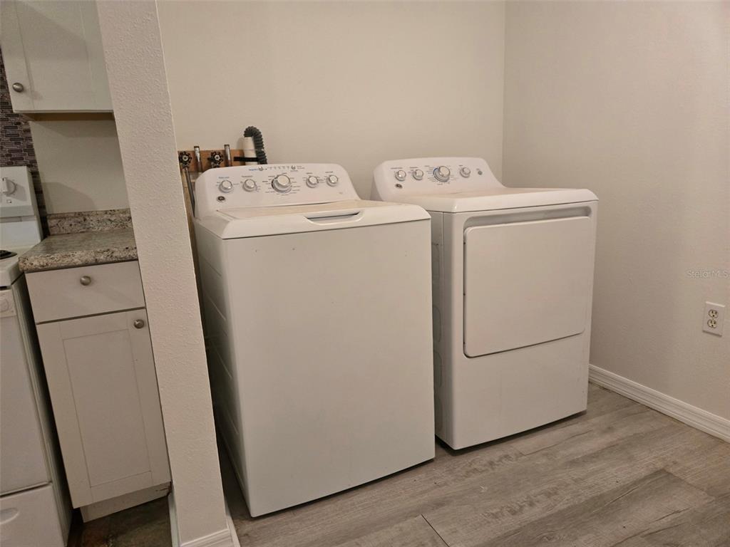 2115 5th Street, Unit 2 Sarasota, FL 34237 - Photo 5 of 22 a utility room with dryer and washer