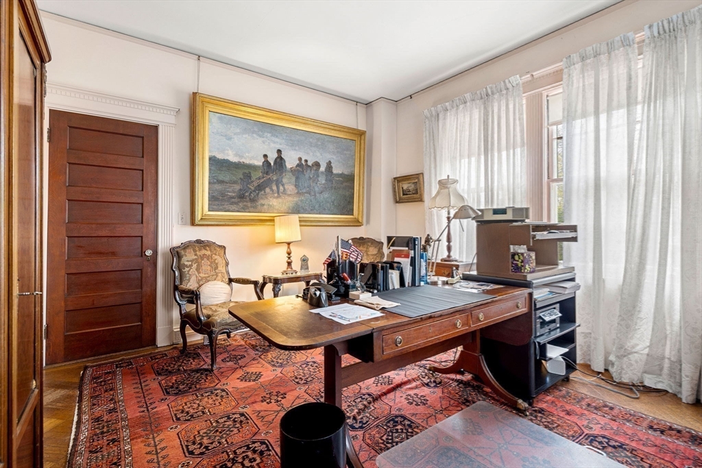 17 Berkeley Street Cambridge, MA 02138 - Photo 17 of 37 a view of a workspace with furniture and window