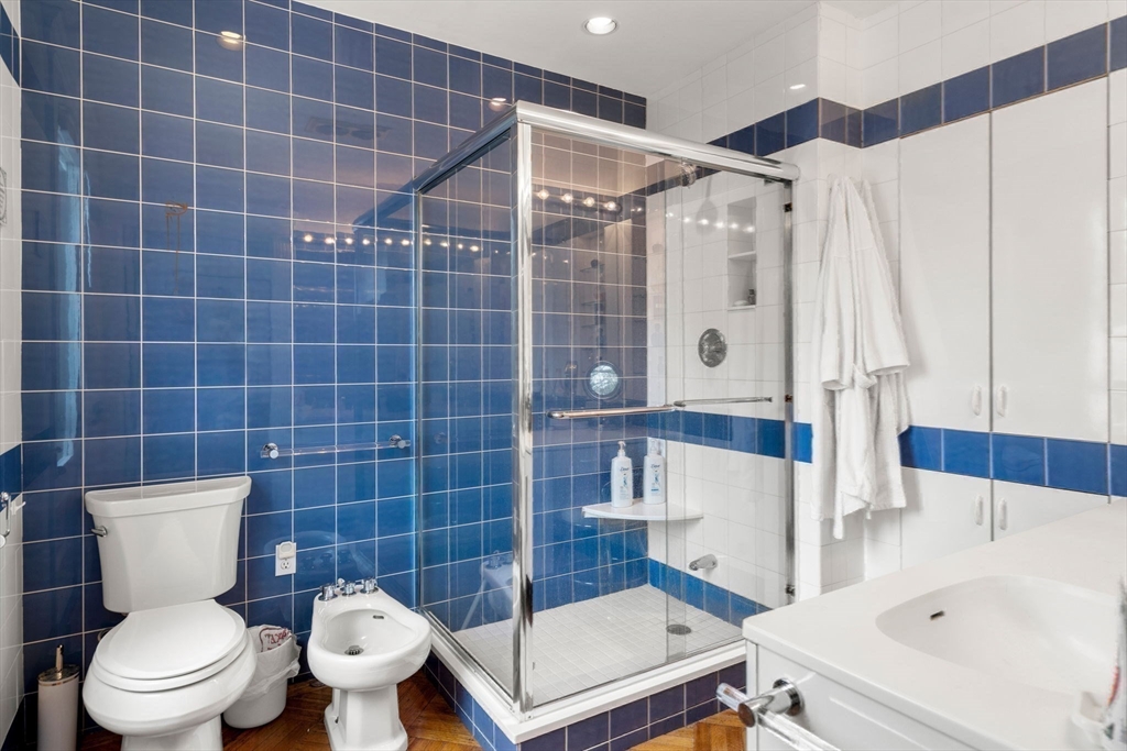 17 Berkeley Street Cambridge, MA 02138 - Photo 20 of 37 a bathroom with a toilet and a shower