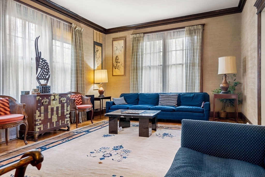17 Berkeley Street Cambridge, MA 02138 - Photo 5 of 37 a living room with furniture and a large window