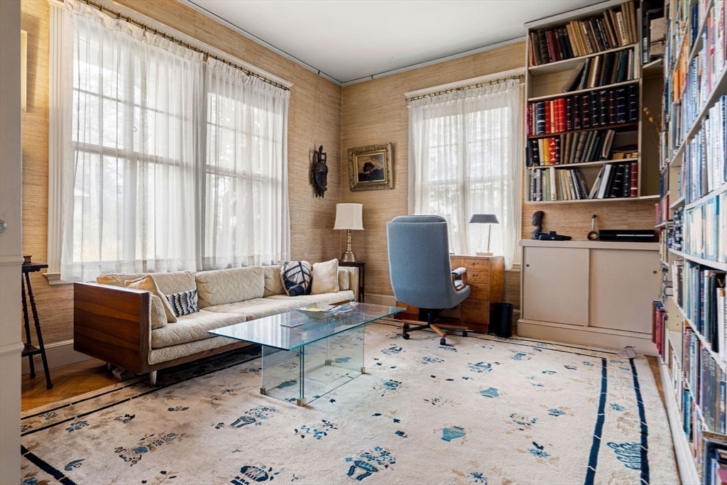 17 Berkeley Street Cambridge, MA 02138 - Photo 8 of 37 a living room with furniture a rug and a window
