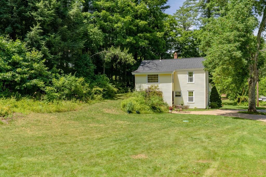11 Dingley Dell Road Brimfield, MA 01010 - Photo 11 of 42 a front view of a house with a yard