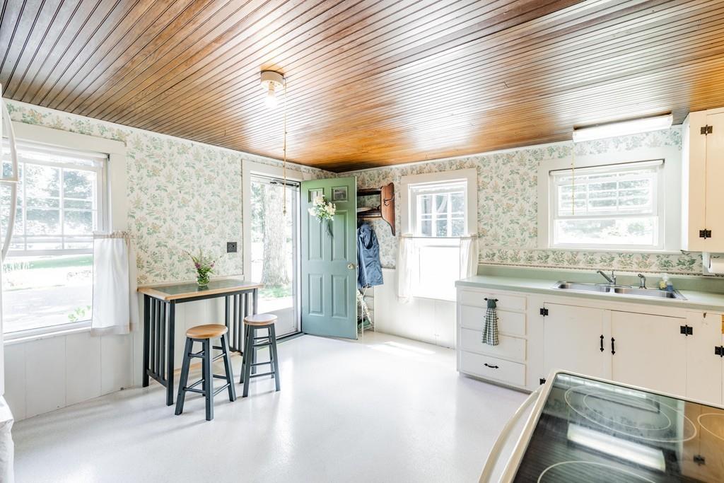11 Dingley Dell Road Brimfield, MA 01010 - Photo 14 of 42 a large white kitchen with a large window