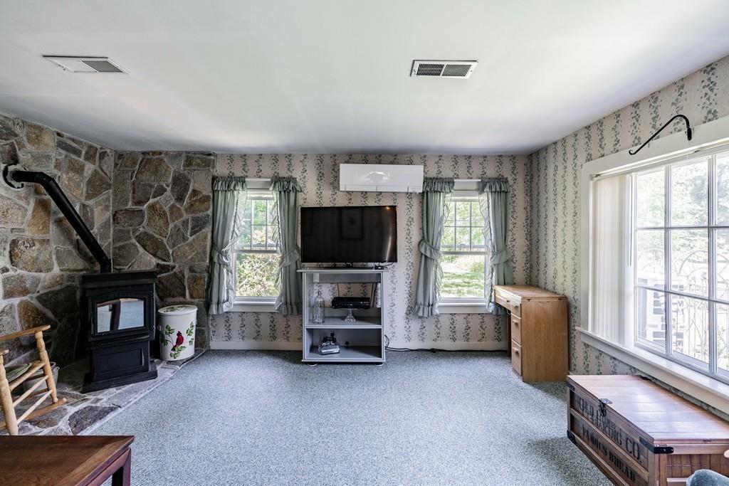 11 Dingley Dell Road Brimfield, MA 01010 - Photo 23 of 42 a living room with furniture and a flat screen tv