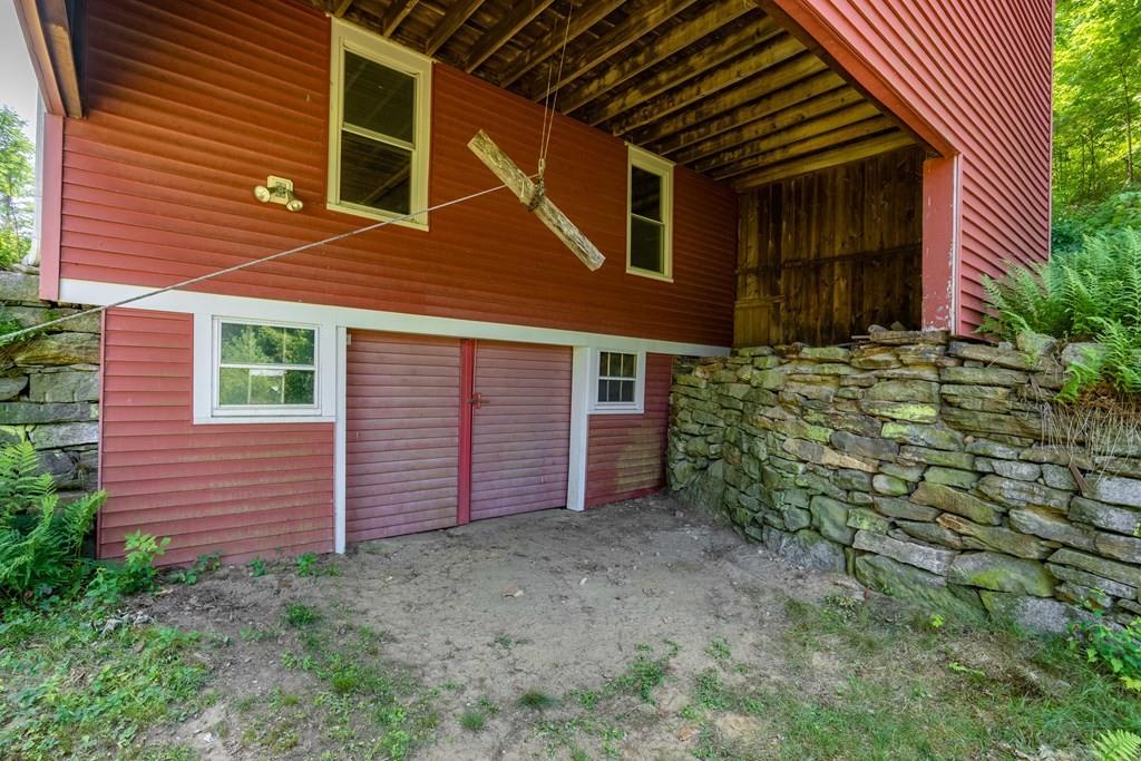 11 Dingley Dell Road Brimfield, MA 01010 - Photo 41 of 42 a view of a backyard of the house