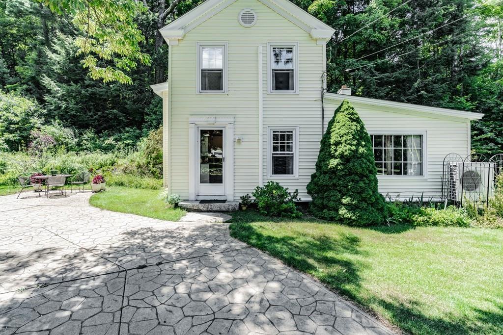 11 Dingley Dell Road Brimfield, MA 01010 - Photo 7 of 42 a view of a house with yard and plants