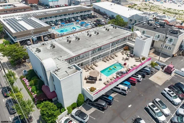 an aerial view of a building with outdoor space