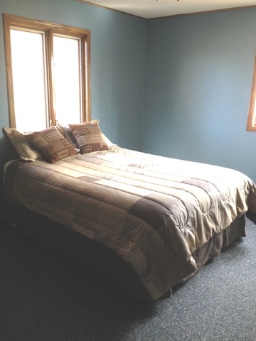 463 Reuter Road Amboy, IL 61310 - Photo 4 of 11 a bedroom with a bed and window