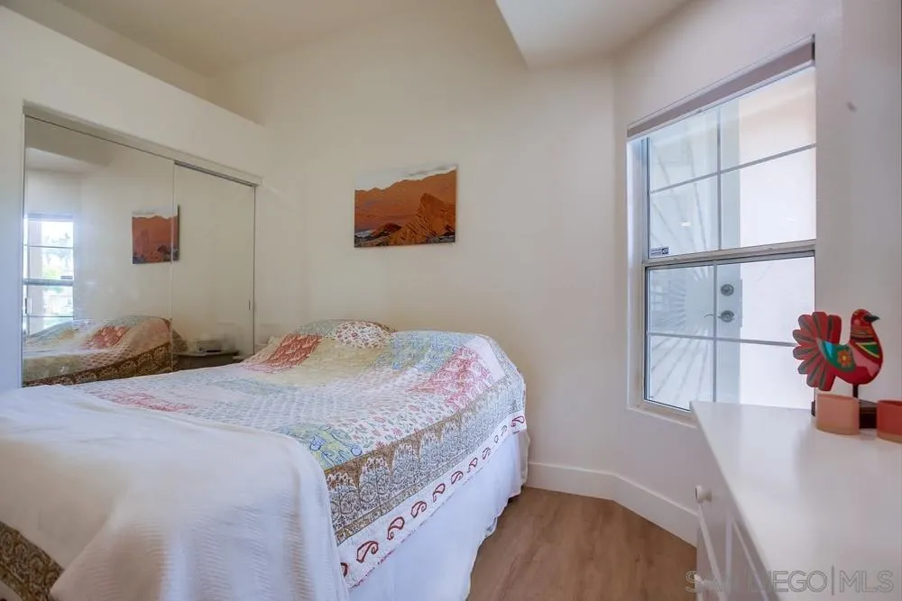 2322 Byron Place Carlsbad, CA 92008 - Photo 22 of 56 a bedroom with a bed and a window