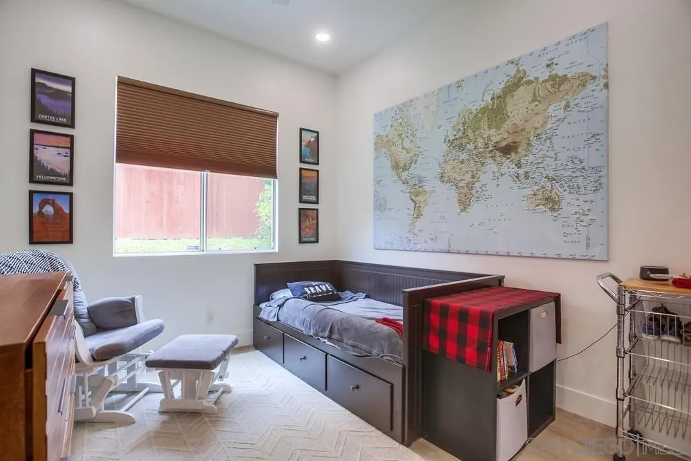 2322 Byron Place Carlsbad, CA 92008 - Photo 30 of 56 a bedroom with a bed and a window