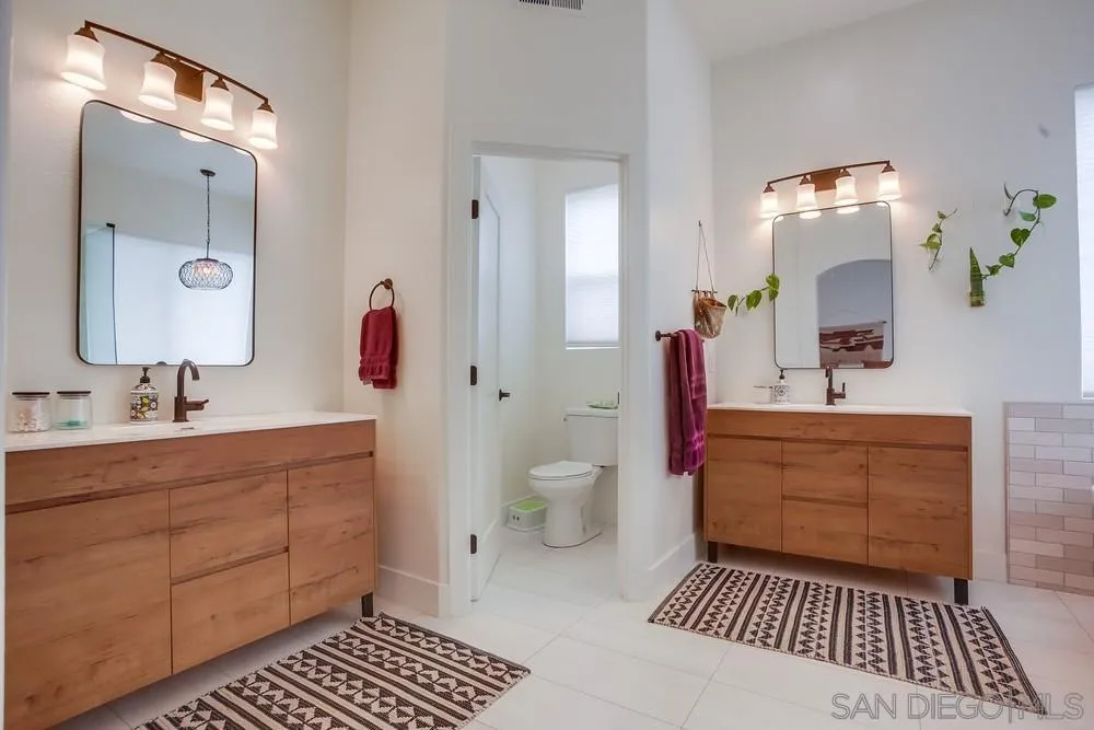 2322 Byron Place Carlsbad, CA 92008 - Photo 36 of 56 a bathroom with a sink toilet and shower