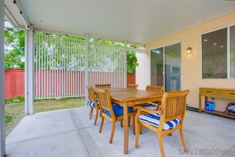 2322 Byron Place Carlsbad, CA 92008 - Photo 44 of 56 a view of an outdoor dining space with a table and chairs