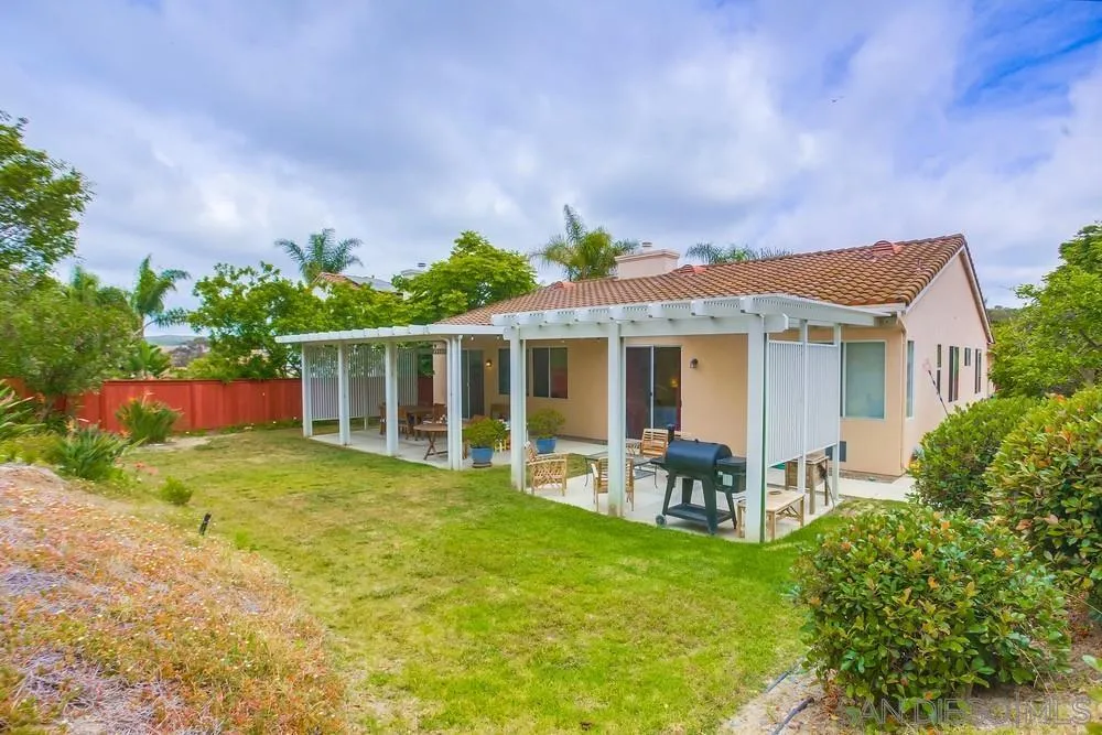 2322 Byron Place Carlsbad, CA 92008 - Photo 50 of 56 front view of a house with a yard