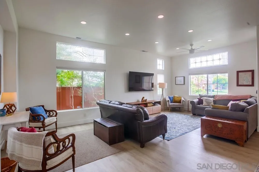 2322 Byron Place Carlsbad, CA 92008 - Photo 6 of 56 a living room with furniture flat screen tv and window