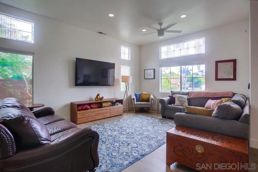 2322 Byron Place Carlsbad, CA 92008 - Photo 7 of 56 a living room with furniture and a flat screen tv