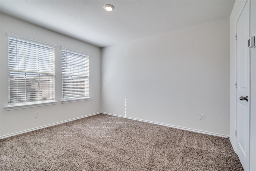 3025 Frazier Street Forney, TX 75126 - Photo 21 of 25 a view of an empty room with a window