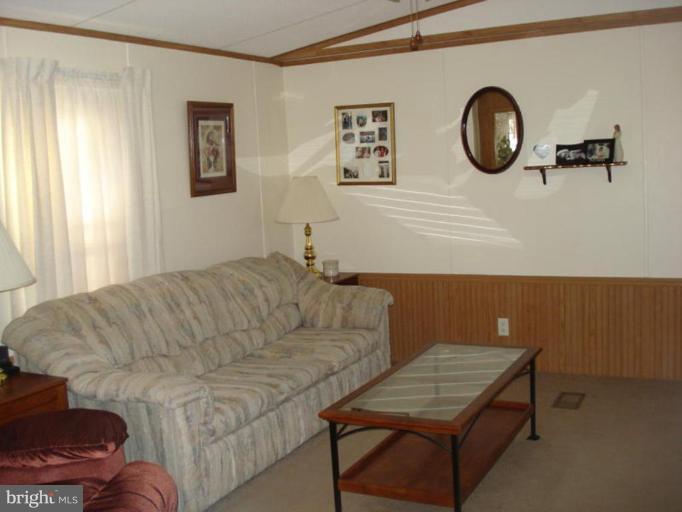 128 German Chapel Road Prince Frederick, MD 20678 - Photo 7 of 13 Vaulted ceiling in living room