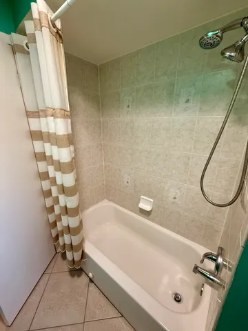 a bathroom with a sink and a shower