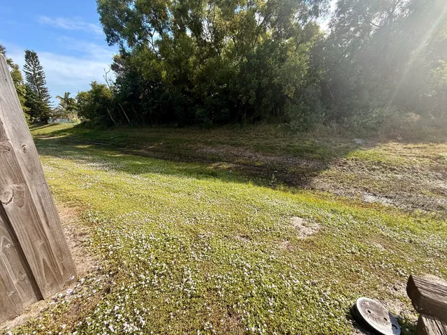 a view of a yard with an outdoor space