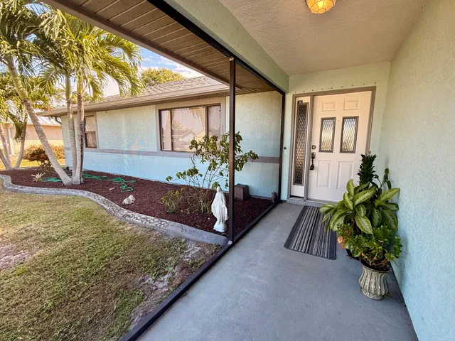 a view of a porch with furniture