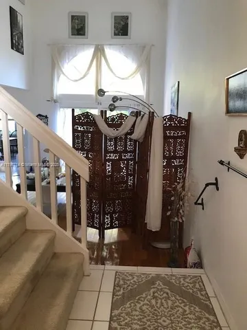 a dinning area with furniture and table