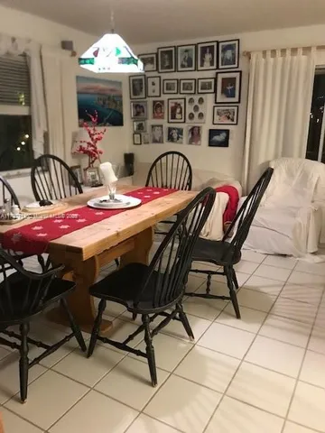 a spacious bathroom with a bathtub and shower