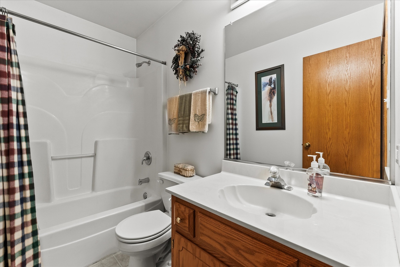 4513 Skylark Lane Plainfield, IL 60586 - Photo 14 of 23 a bathroom with a sink toilet tub and shower