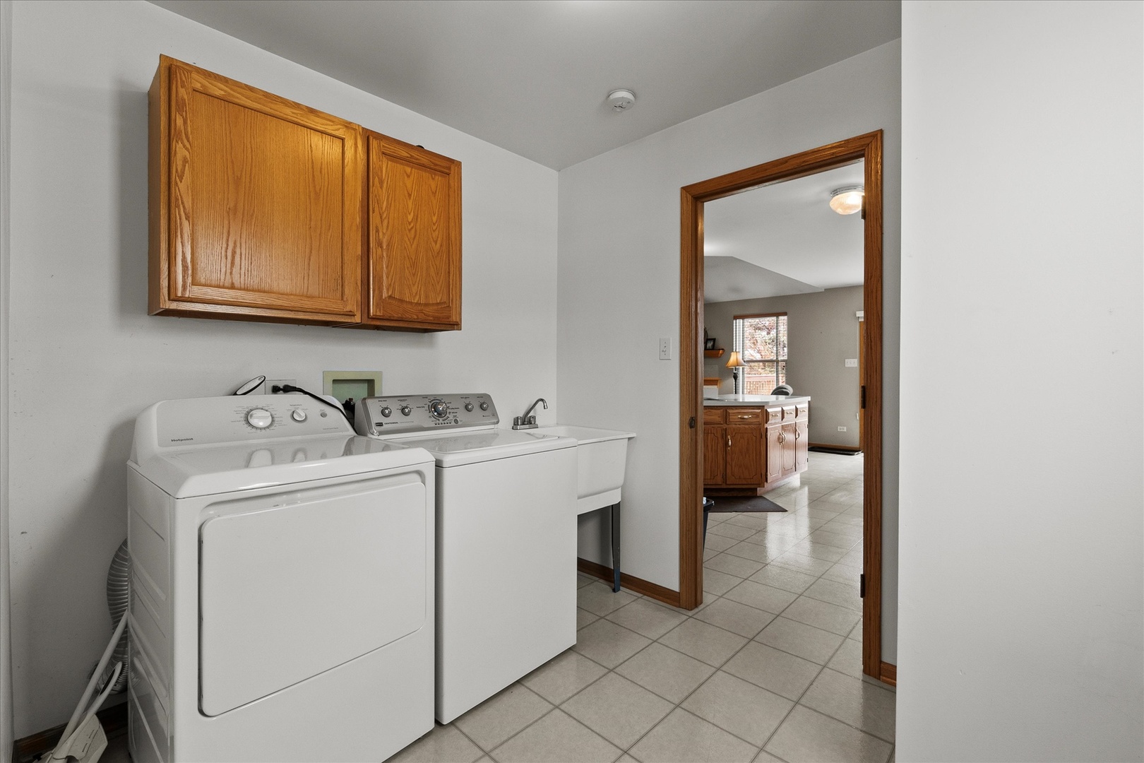 4513 Skylark Lane Plainfield, IL 60586 - Photo 16 of 23 a utility room with dryer and washer