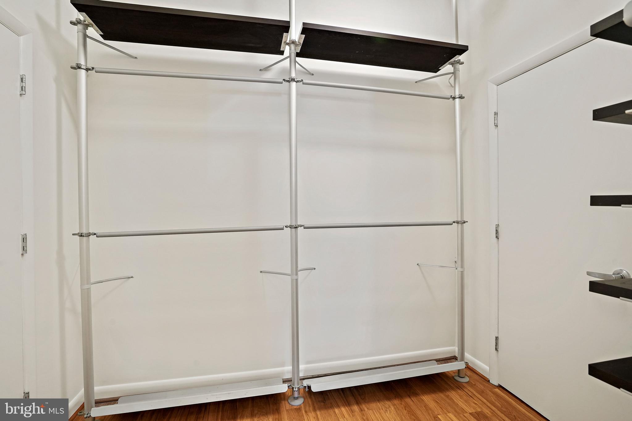 1300 N Street Northwest, Unit 106 Washington, DC 20005 - Photo 14 of 23 Walk in closet with laundry