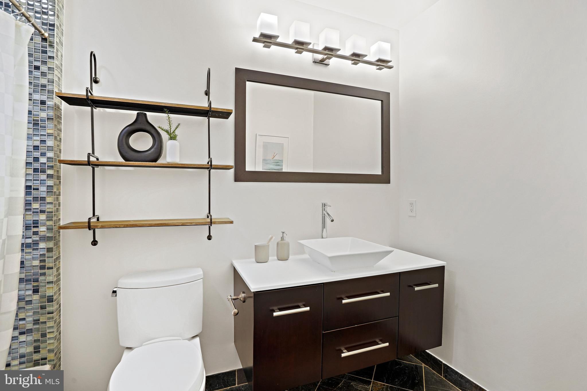 1300 N Street Northwest, Unit 106 Washington, DC 20005 - Photo 15 of 23 Spacious bathroom
