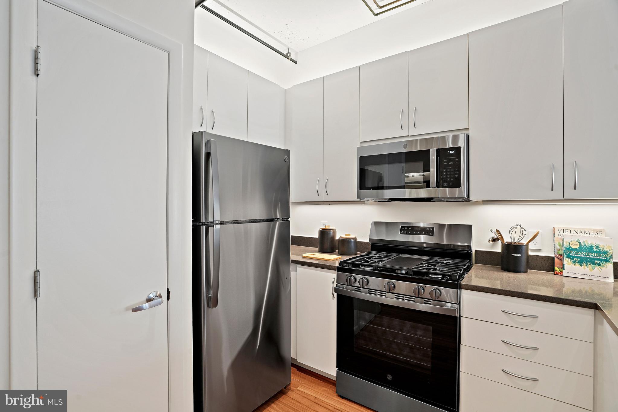 1300 N Street Northwest, Unit 106 Washington, DC 20005 - Photo 5 of 23 New and updated kitchen appliances