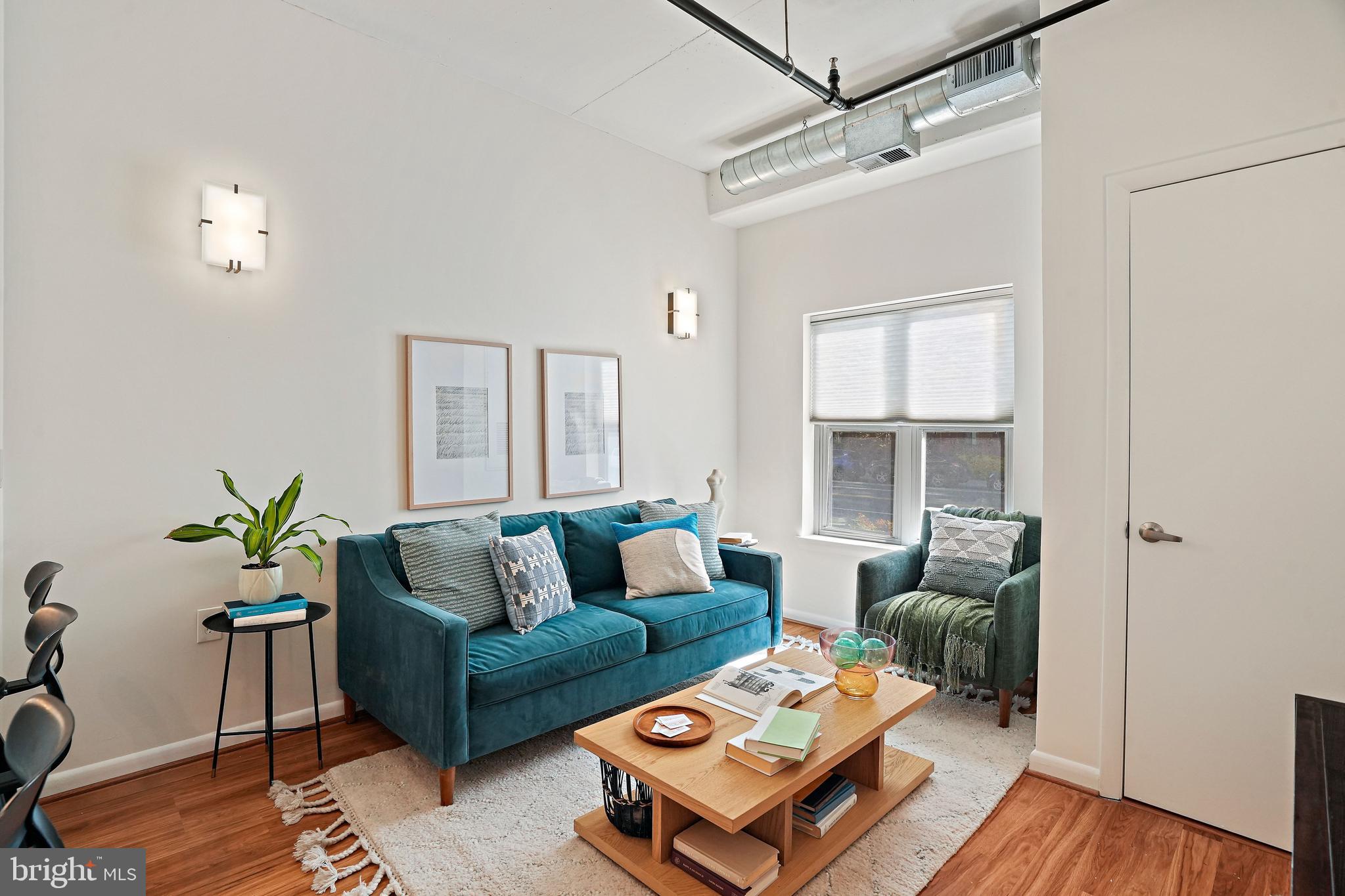 1300 N Street Northwest, Unit 106 Washington, DC 20005 - Photo 8 of 23 Living area with street views