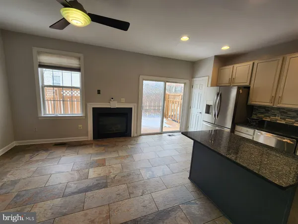 a view of a kitchen with a sink and a microwave