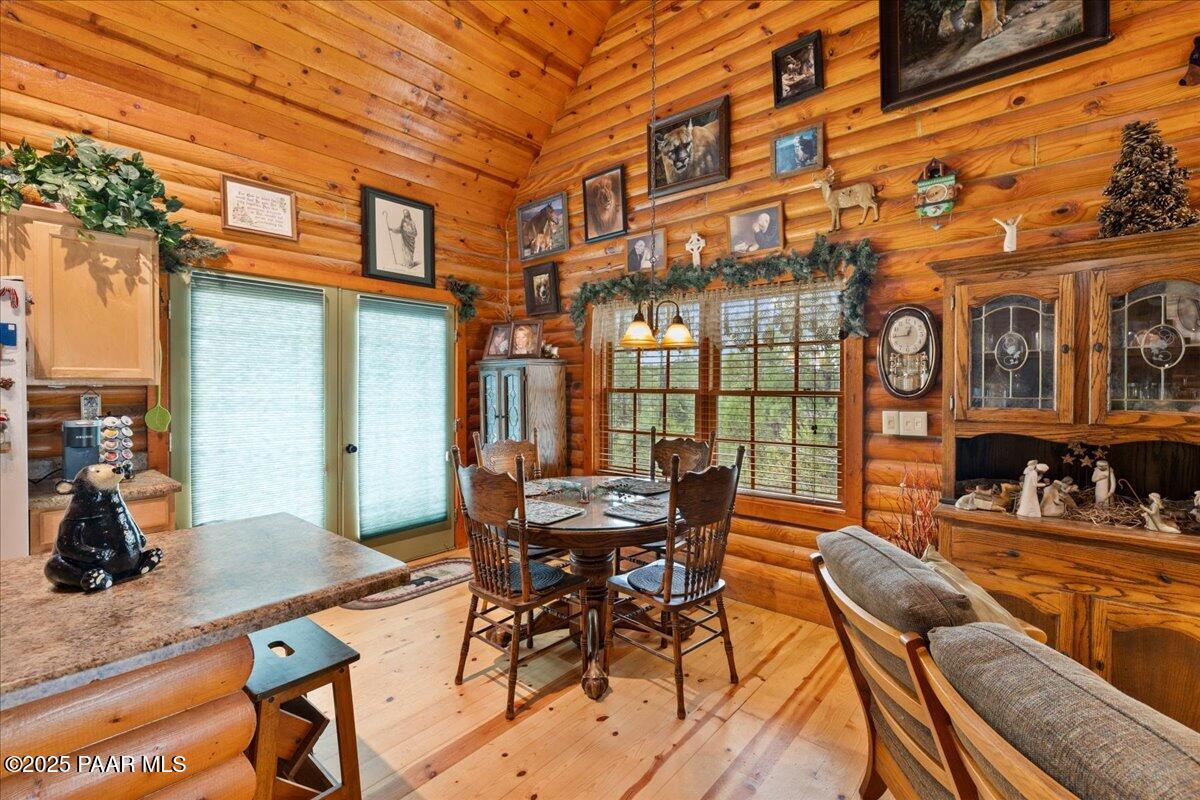 1370 East Pine Ridge Drive Prescott, AZ 86303 - Photo 12 of 32 a view of a patio with a table and chairs and potted plants