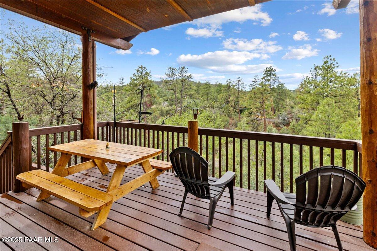 1370 East Pine Ridge Drive Prescott, AZ 86303 - Photo 26 of 32 a view of a chairs on wooden deck