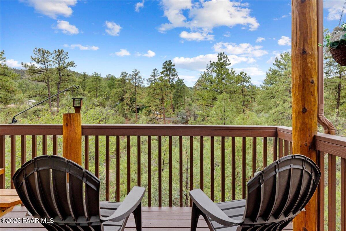 1370 East Pine Ridge Drive Prescott, AZ 86303 - Photo 27 of 32 a view of a two chairs in the balcony