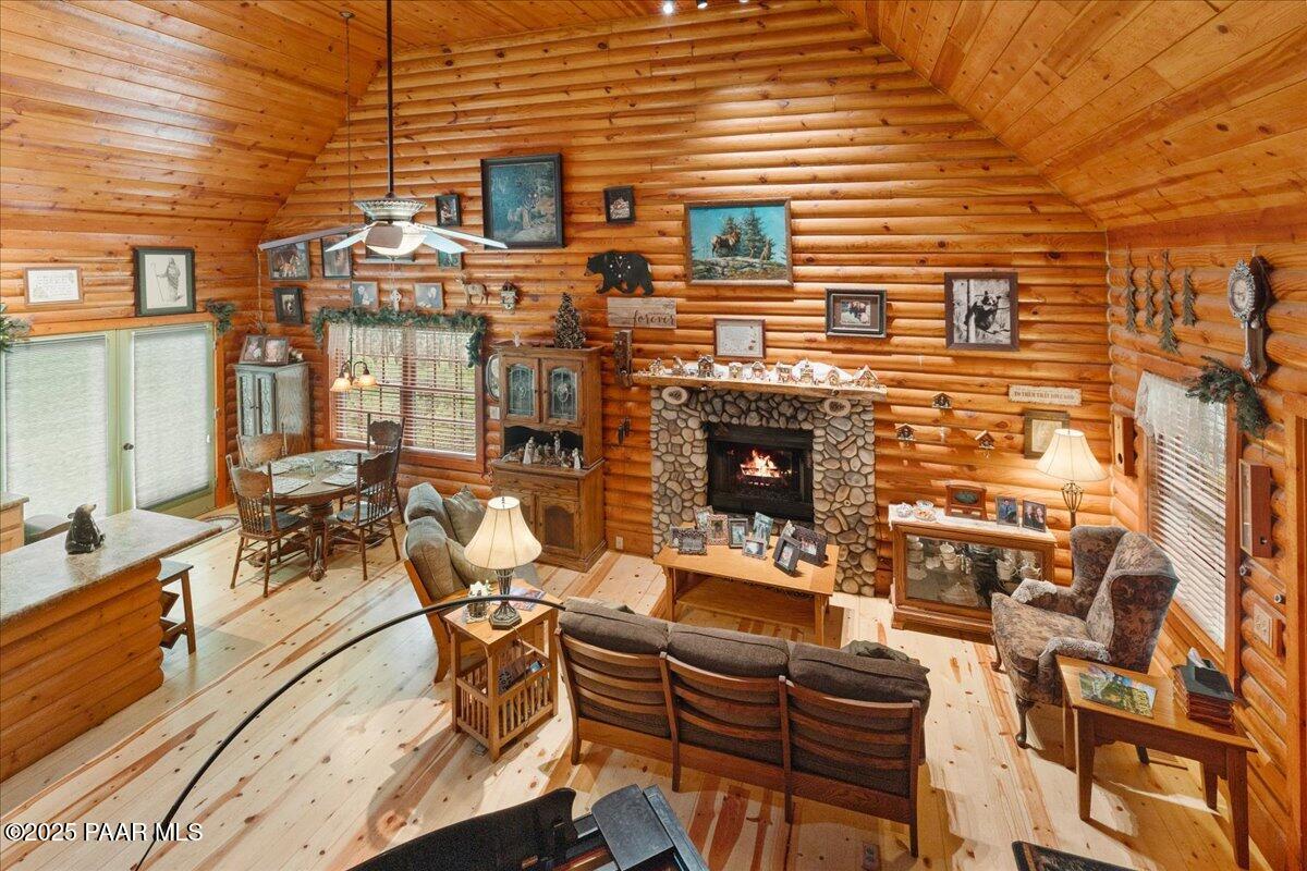 1370 East Pine Ridge Drive Prescott, AZ 86303 - Photo 7 of 32 a view of a patio with chairs and potted plants