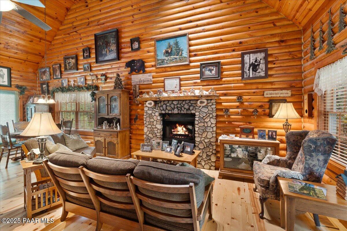 1370 East Pine Ridge Drive Prescott, AZ 86303 - Photo 10 of 32 a view of a patio with couches table and chairs and potted plants