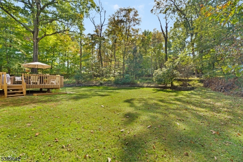 202 Mt Horeb Road Warren, NJ 07059 - Photo 21 of 23 a yellow building in the middle of a yard