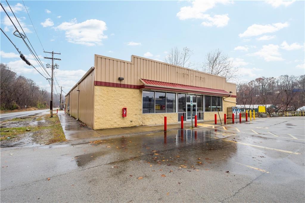 26 Front Street Millsboro, PA 15348 - Photo 2 of 24 a view of a house with sitting area