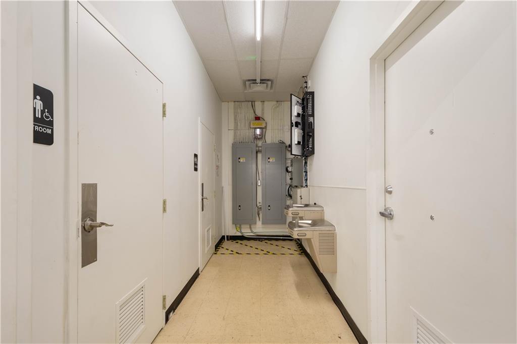 26 Front Street Millsboro, PA 15348 - Photo 24 of 24 a view of a hallway with a white walls