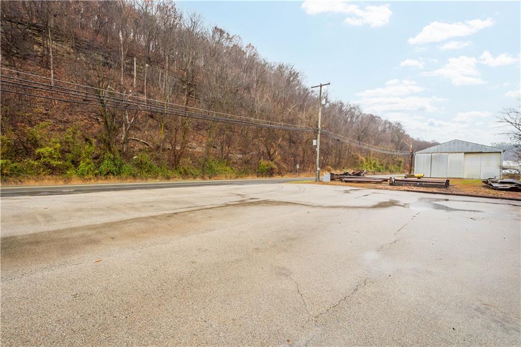 26 Front Street Millsboro, PA 15348 - Photo 6 of 24 a view of road with large building