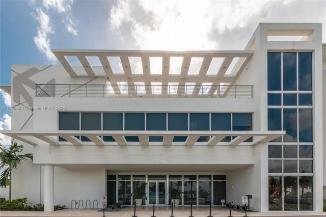 a view of a park with swings and slides