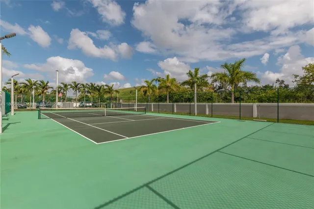 a living room with a couch and a flat screen tv