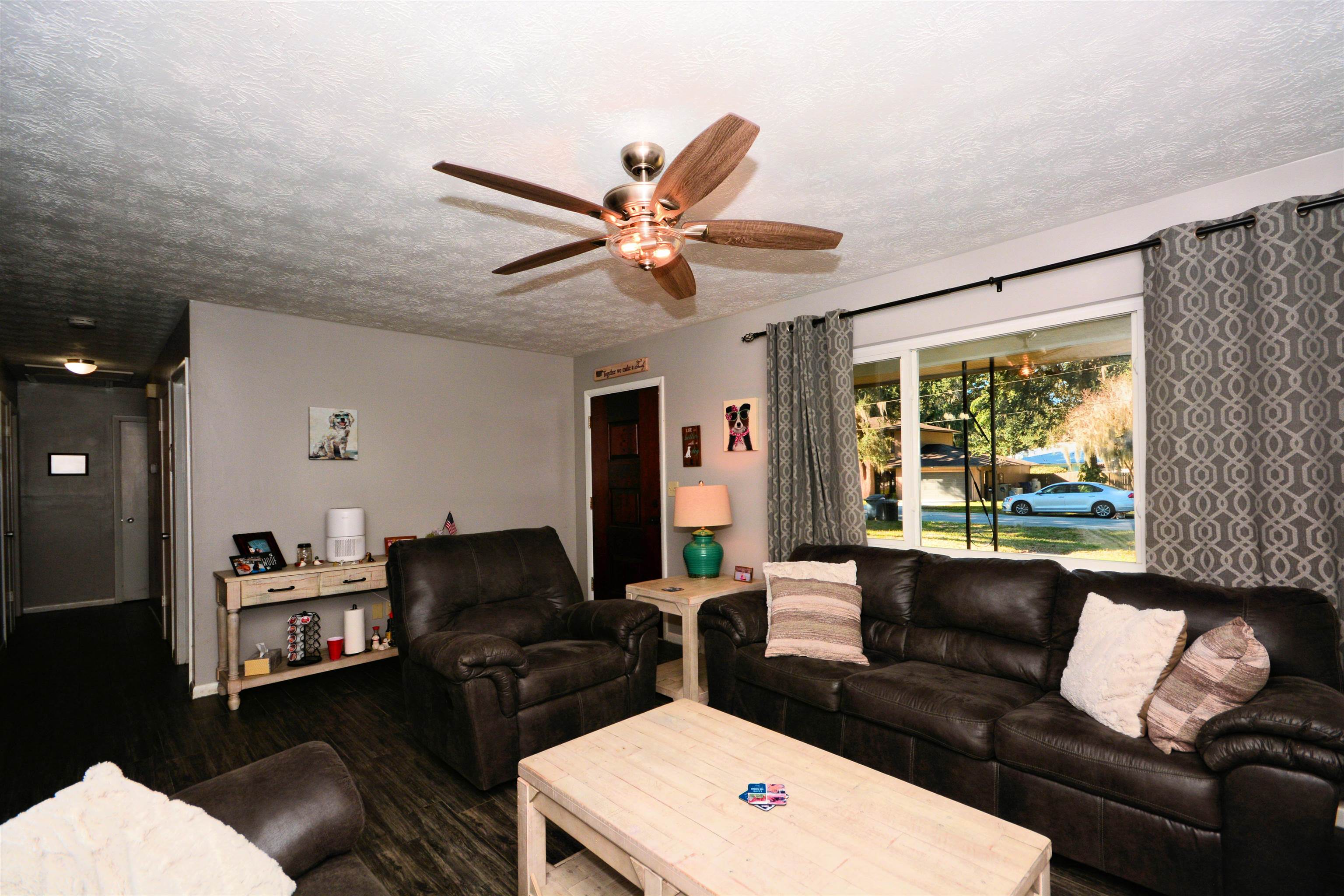 253 Mimosa Road St. Augustine, FL 32086 - Photo 17 of 42 a living room with furniture and a large window