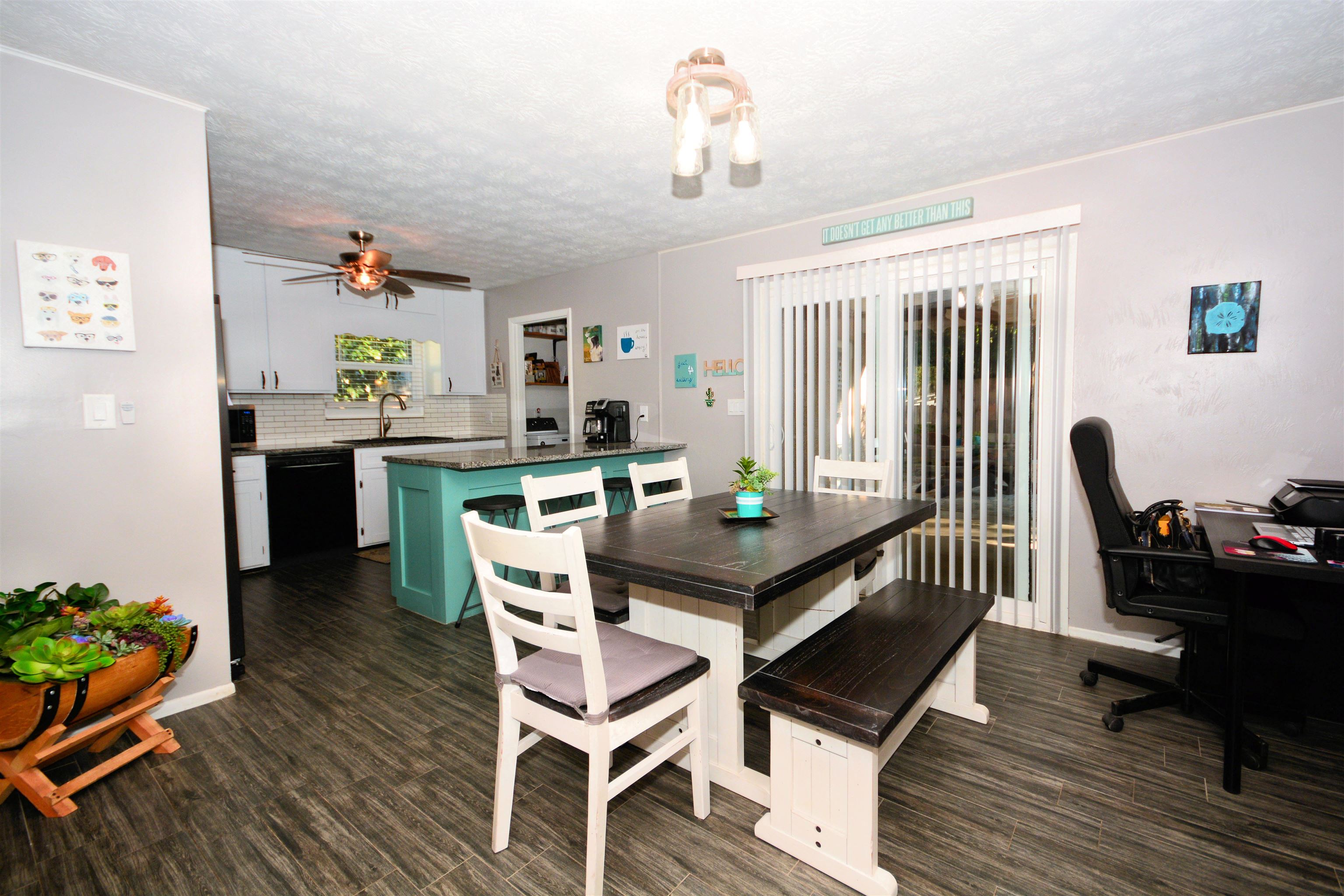 253 Mimosa Road St. Augustine, FL 32086 - Photo 19 of 42 a dining room with furniture and wooden floor