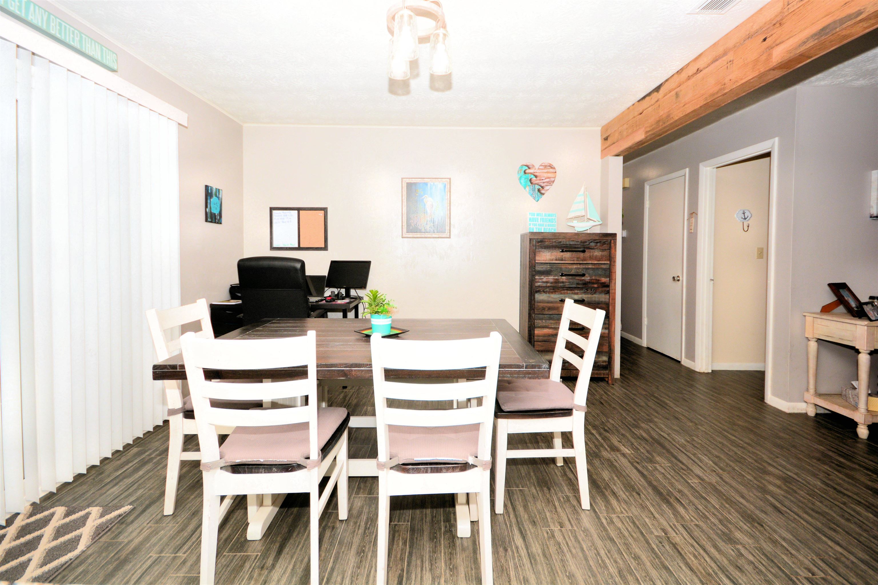 253 Mimosa Road St. Augustine, FL 32086 - Photo 20 of 42 a dining room with furniture and wooden floor