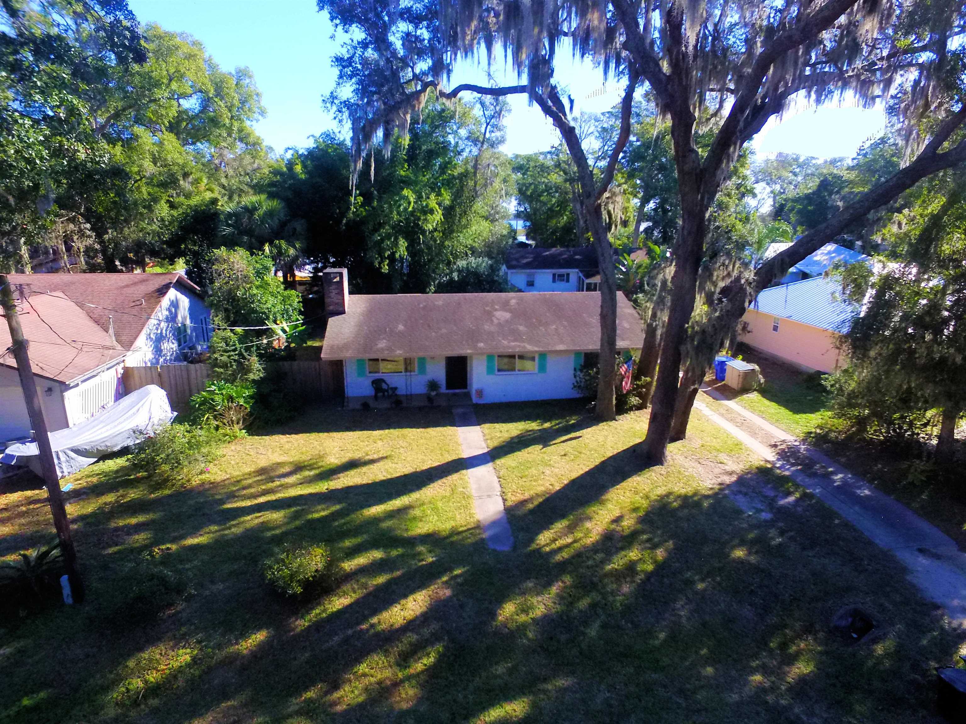 253 Mimosa Road St. Augustine, FL 32086 - Photo 2 of 42 a view of a house with a yard
