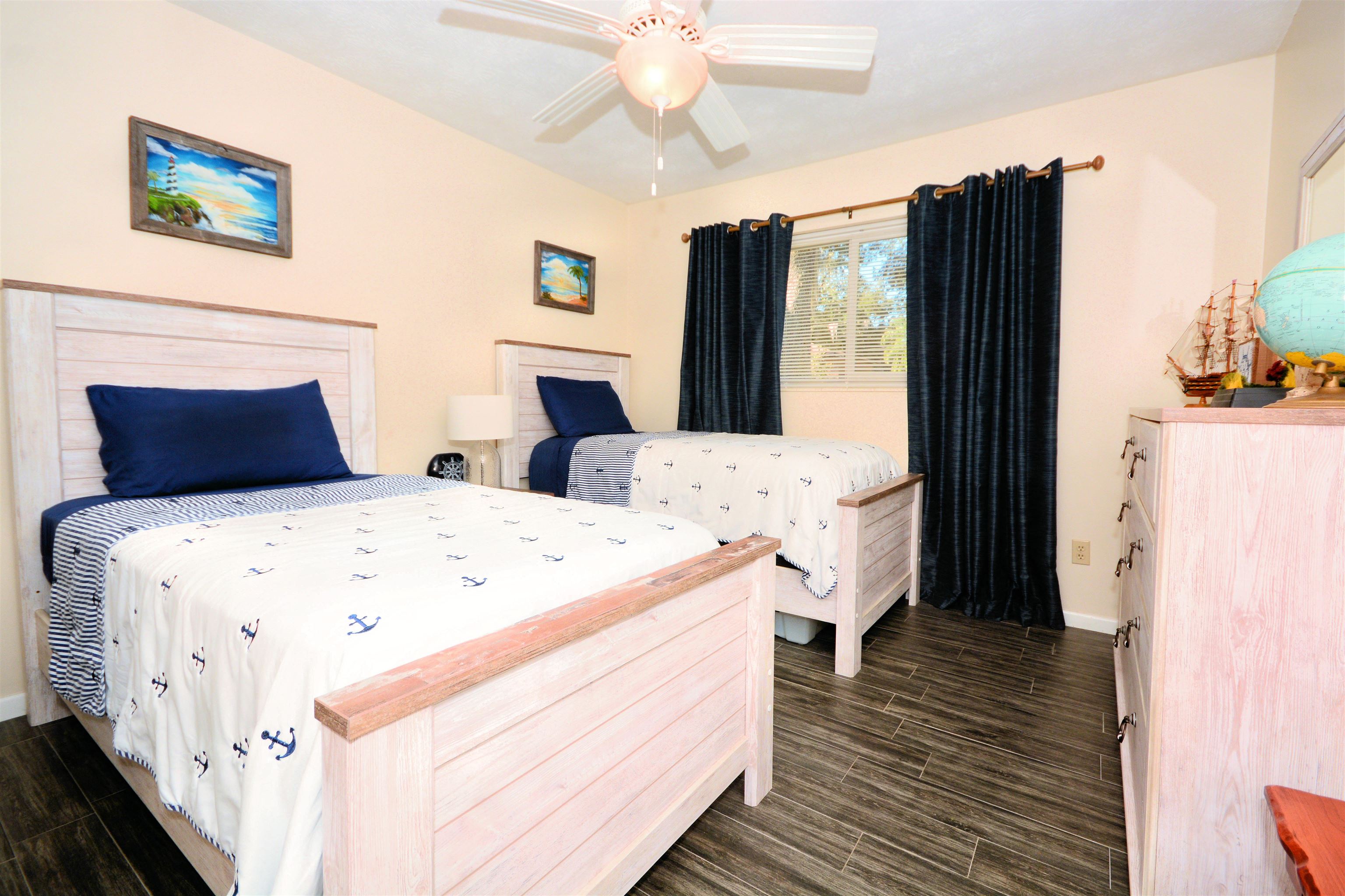 253 Mimosa Road St. Augustine, FL 32086 - Photo 26 of 42 a bedroom with bed and wooden floor